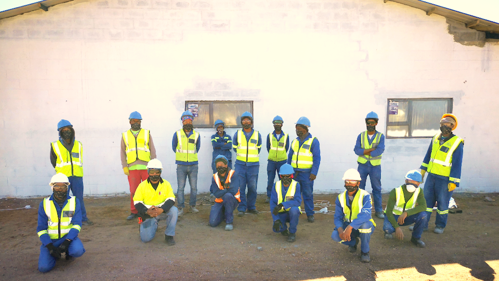 Some of the building team of the Loeriesfontein and Khobab wind farms wearing PE