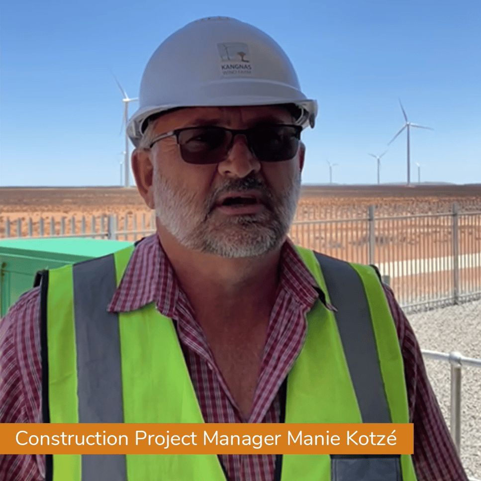 Mainstream construction manager in front of new wind farm