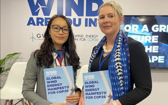 Mainstream's Group CEO Mary Quaney with GWEC's Joyce Lee holding GWEC Manifesto for COP26