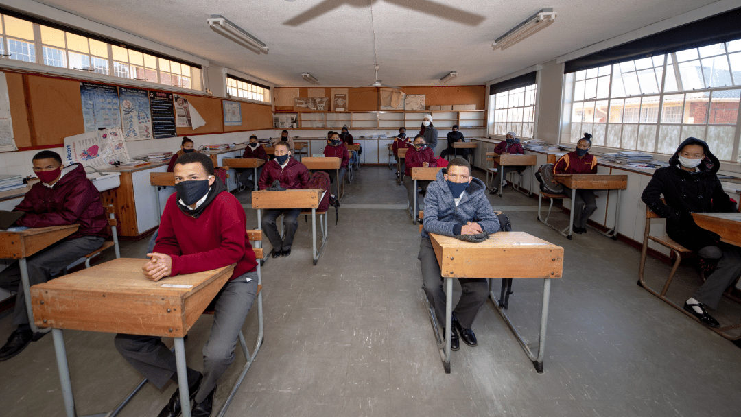School pupils at Van Wyk High School seated in class wearing Covid masks
