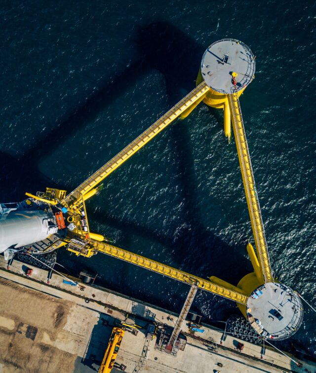 an aerial view of a floating offshore wind turbine base