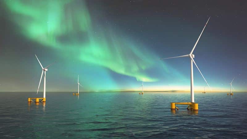 CGI of the northern lights in night sky above six floating offshore wind turbines