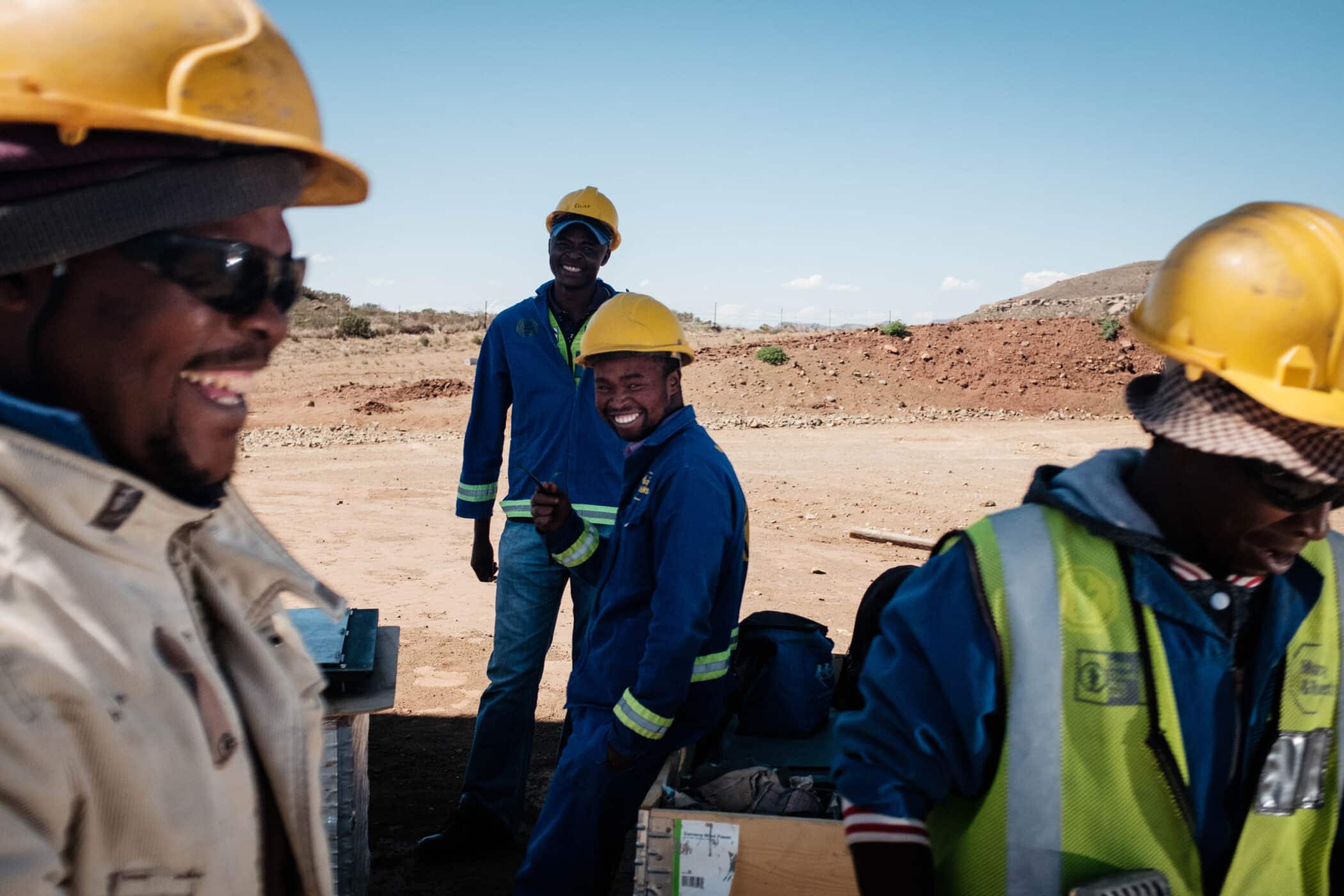 construction workers happy and smiling on site