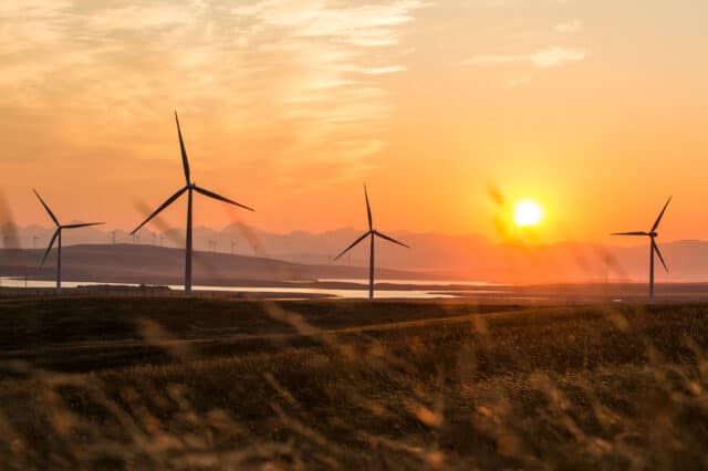 Wind turbines in the sunset - Mainstream Renewable Power