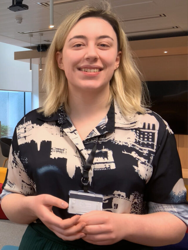 Smiling Mainstream renewable power woman in Dublin office