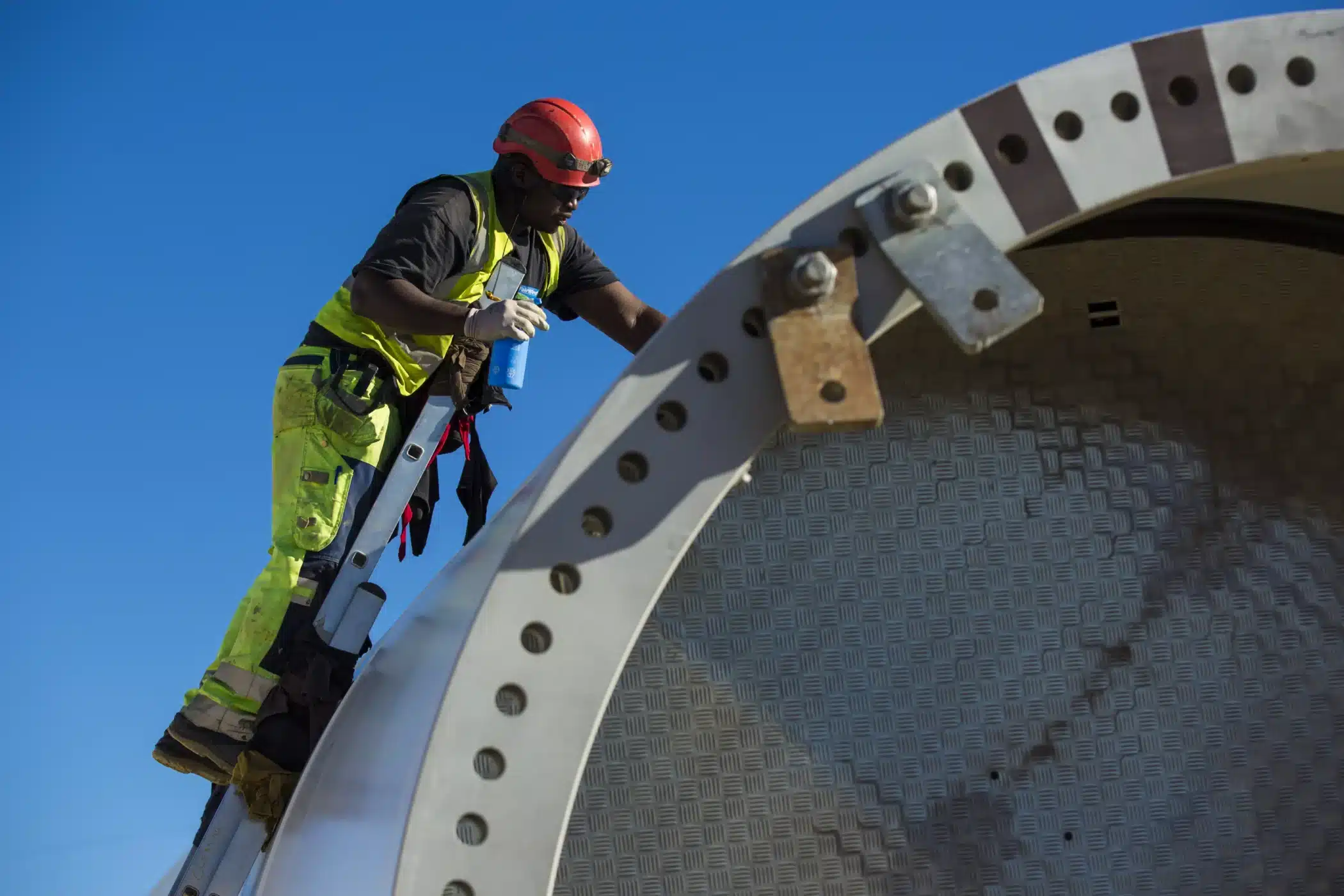 Man working on a wind turbine