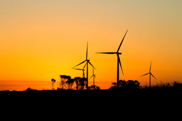 A wind farm at sunset